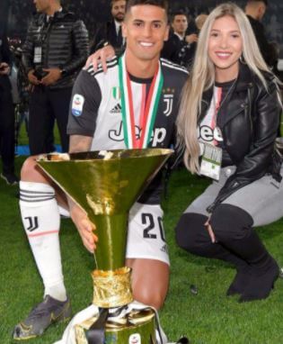 Daniela Machado posed with her partner Joao Cancelo after winning the championship title.